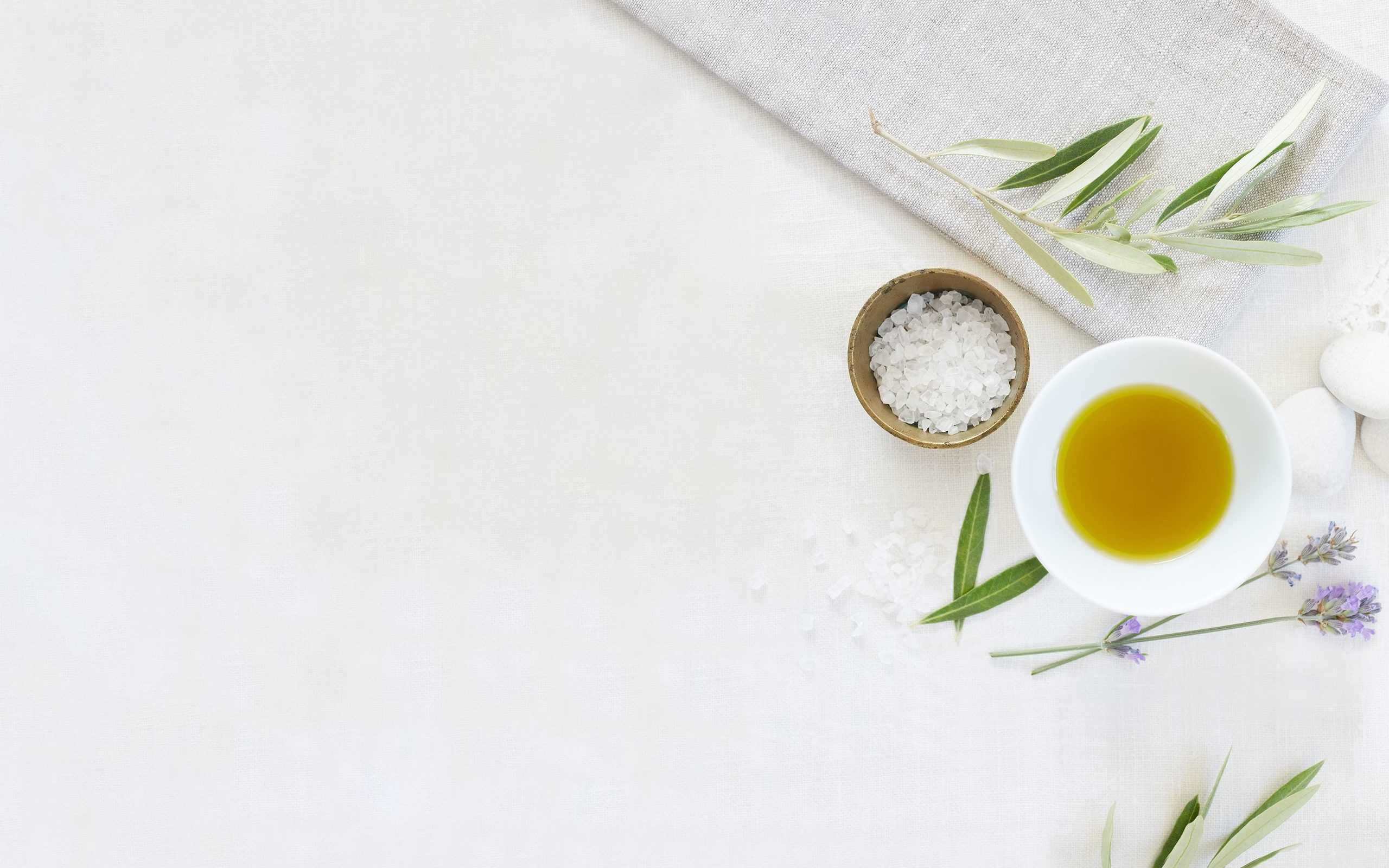 A clean organized arrangement of spa oils, salts and scrubs