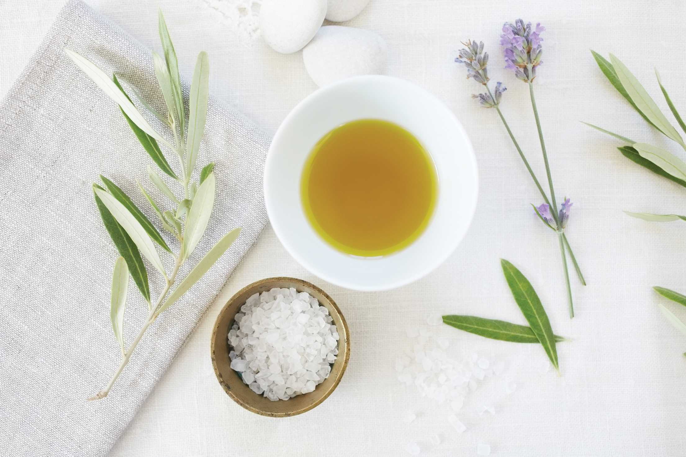 A clean organized arrangement of spa oils, salts and scrubs