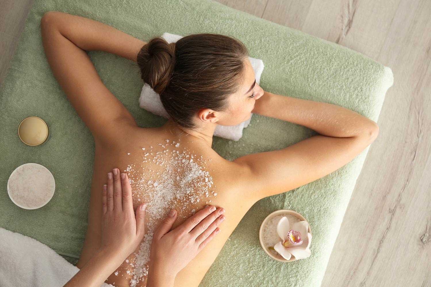 woman receiving a back scrub