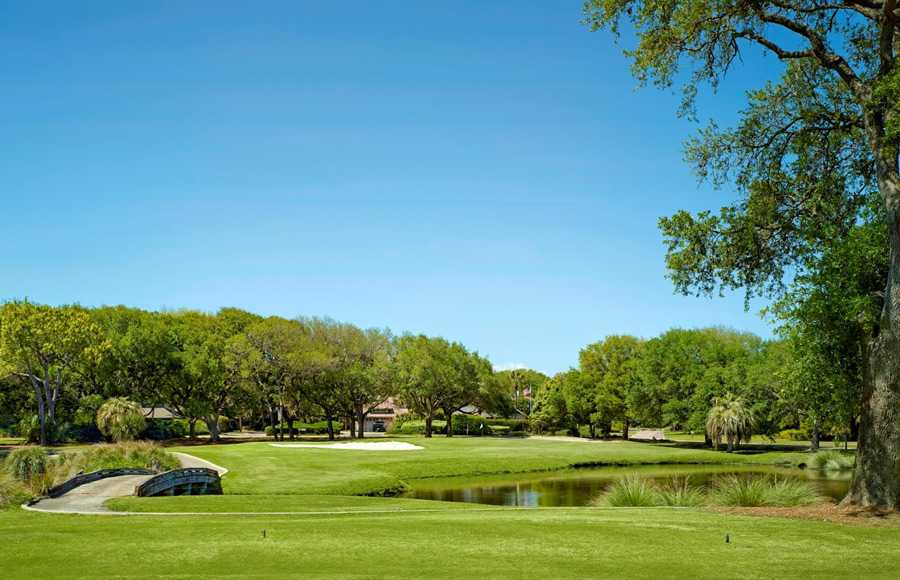 A bright open golf course with crisp green grass
